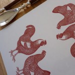 tworedchickens_tablemat